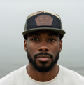 Ain’t Caught Shit Fishing Club – Camo 7-Panel Trucker Hat